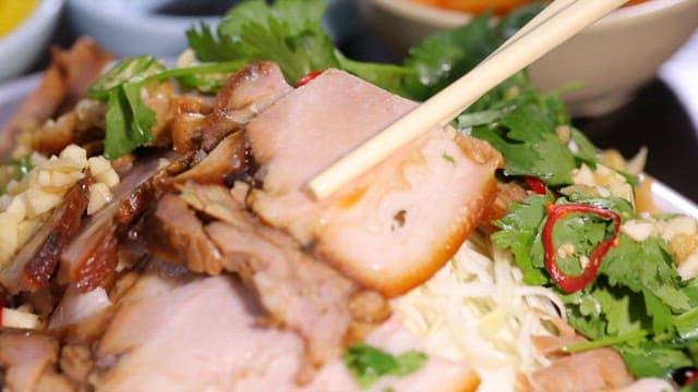 Chopstickful of mouth-watering five-spice pork