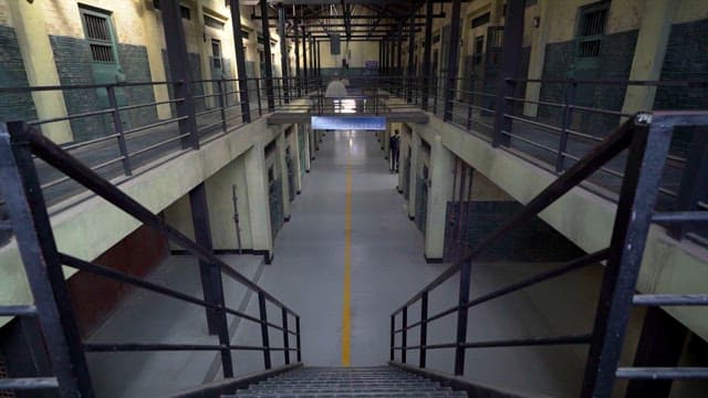 Inside the Prison with Open Rooms on Both Sides