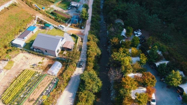Rural Village by a Stream