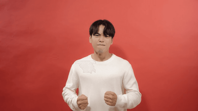 Man expressing strong anger with his fist clenched and an angry expression