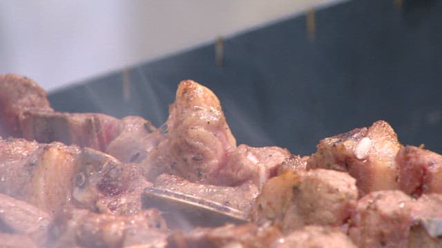 Juicy mutton sashlik grilling over charcoal