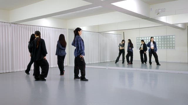 K-POP Dancers Practicing in a Studio