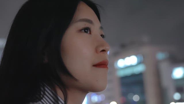 Woman enjoying the city night view