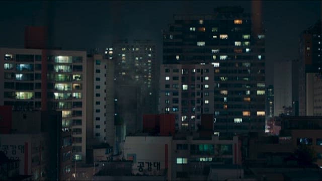 Clothes on a Rooftop Overlooking a Residential Apartment