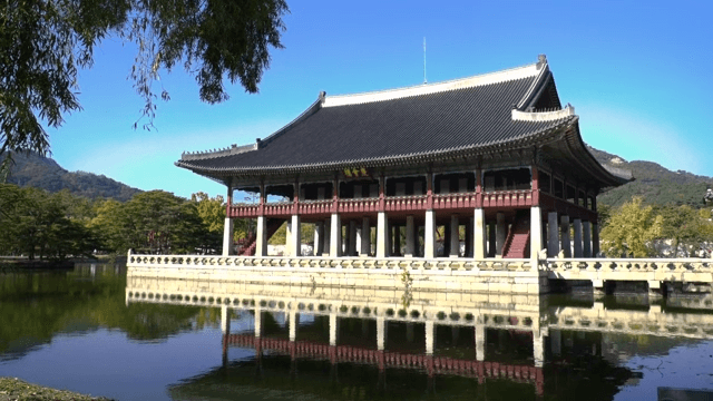 Gyeonghoeru Pavilion at Gyeongbokgung Palace with a tranquil pond and surrounding trees
