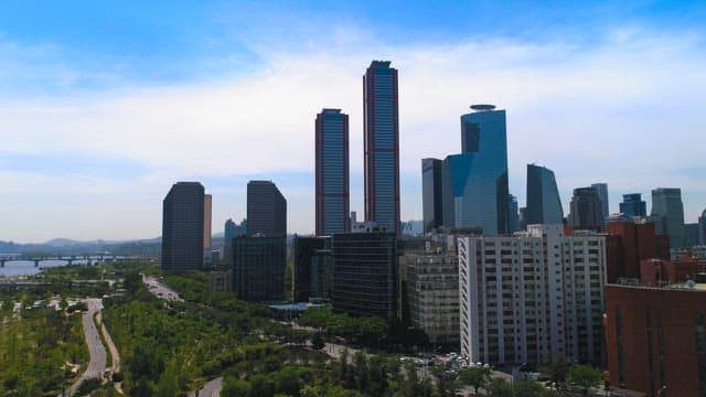 Riverside City with Towering Skyscrapers