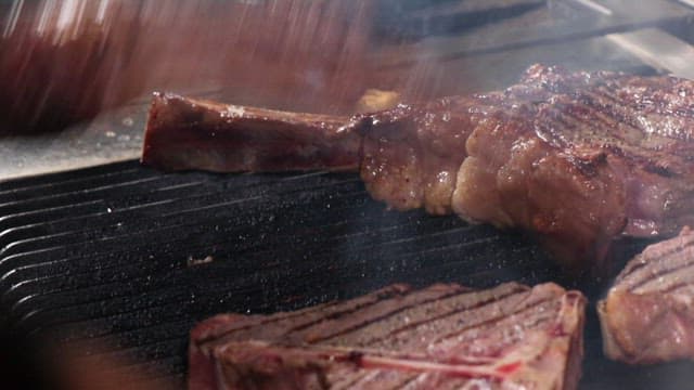 Delicious Steak Grilled on a Hot Iron Plate