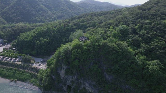 Pavilion Overlooking Forest andr River