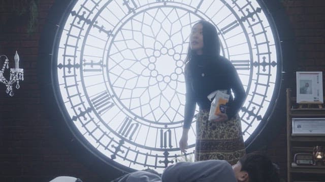 Woman trying to exorcise a person by sprinkling salt on him