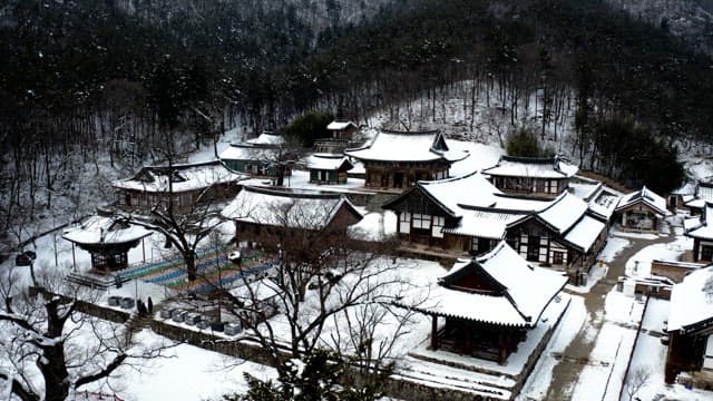 Temple located in the middle of a snow-covered mountain