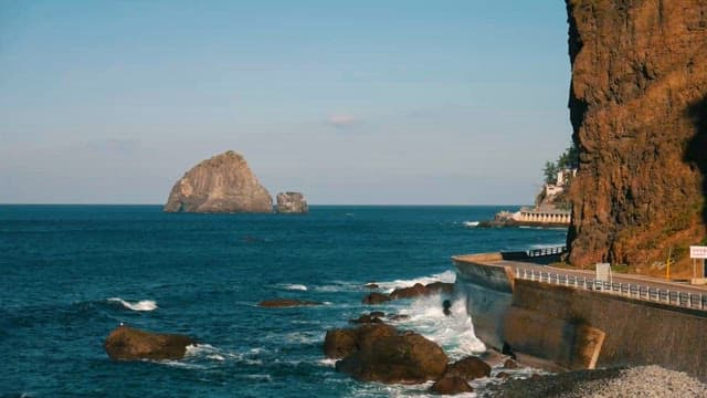 Rocky Coastal Landscape with Clear Blue Sky