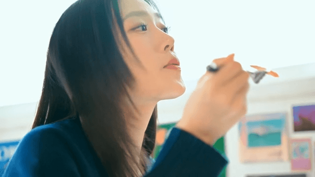 Woman enjoying a meal indoors