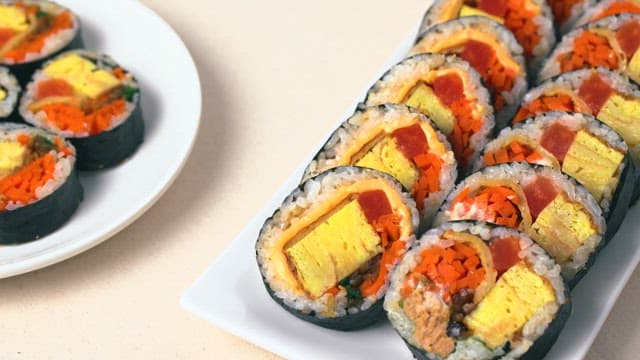 Bite of Neatly Prepared Tuna Kimbap