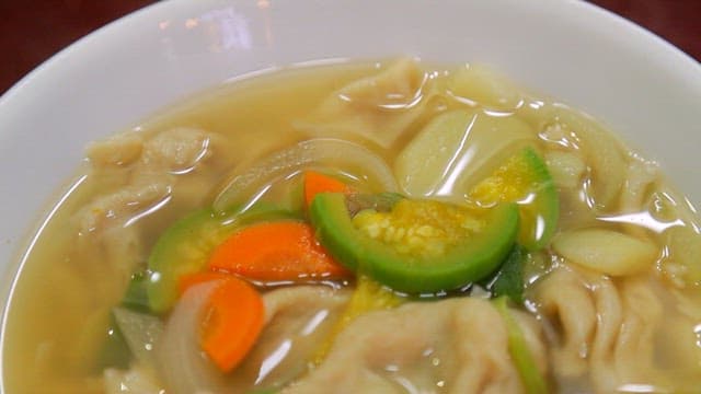 Appetizing handmade sujebi with vegetables and wheat dough