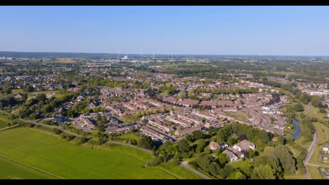 Aerial view of a suburban area with greenery