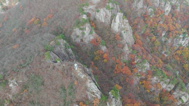 Colorful autumn mountains with rocky peaks