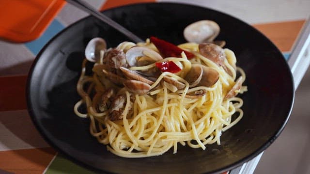 Cooked Octopus on Clam Pasta