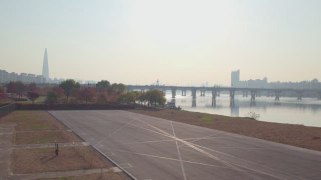 Calm river with a city skyline