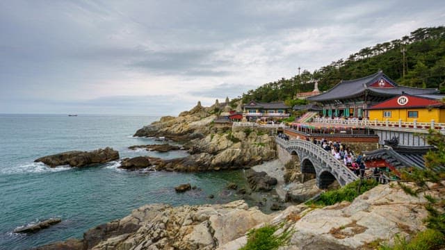 Haedong Yonggungsa Temple in Busan, located on the coast on a cloudy day