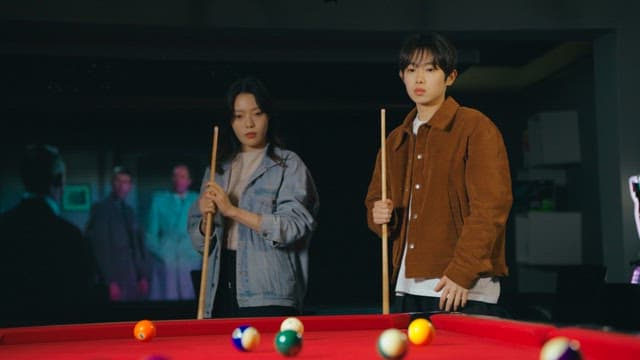 Friends Competing in a Game of Pool