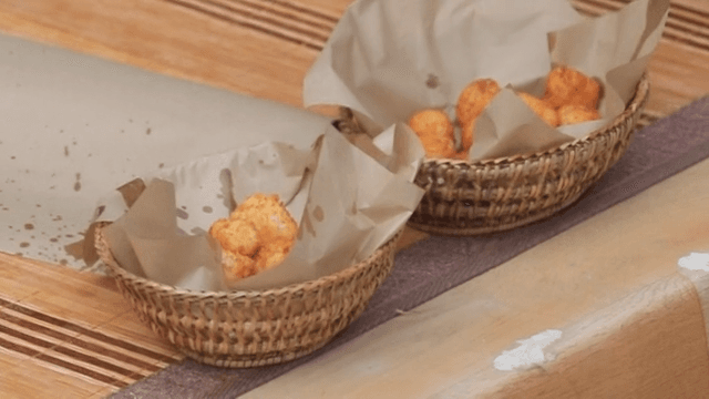 Basket of milk fritters on a table