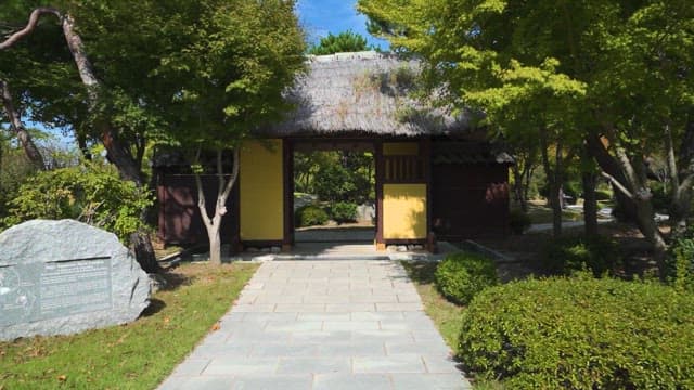Lush Garden with Korean Traditional Gateway