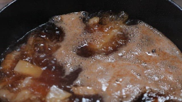 Pork and radish soup boiling in a pot