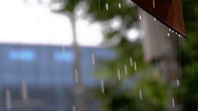Rain falling from a edge of awning