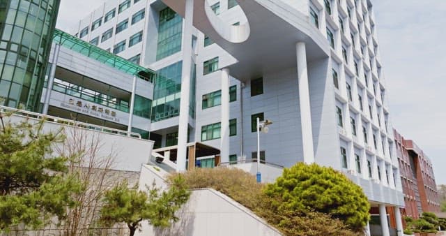 Modern university building with glass facade