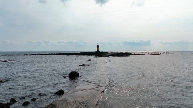 Lighthouse on a rocky coastline