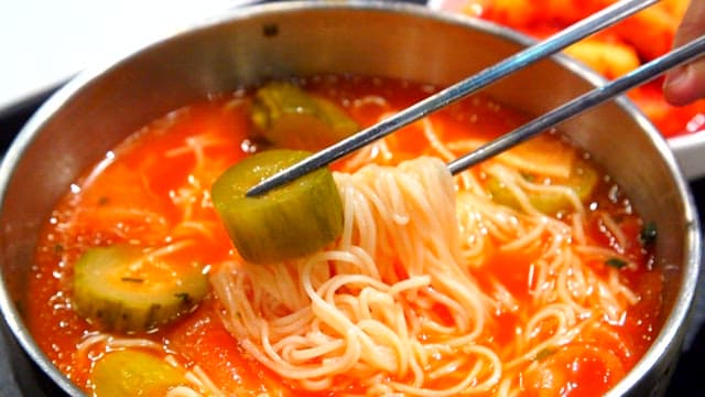 Chopstickful of sour and refreshing cucumber noodles