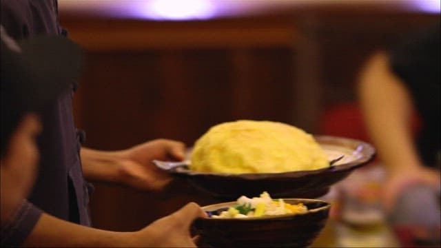 Fluffy Omelet Served on Dinner Table