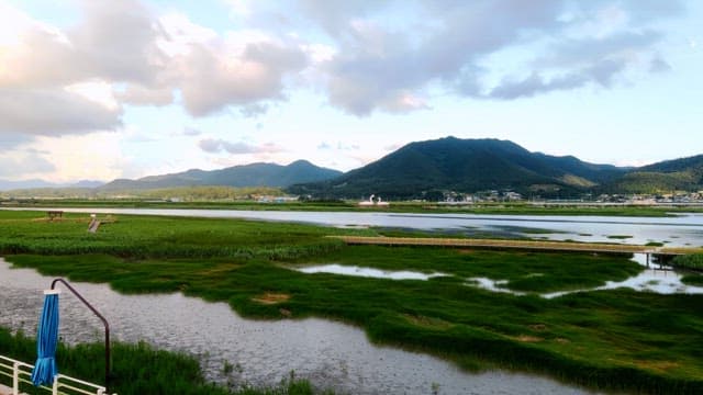 Serene river landscape with mountains