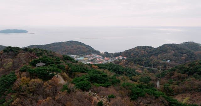 Autumn-Colored Mountains and Coastal Villages