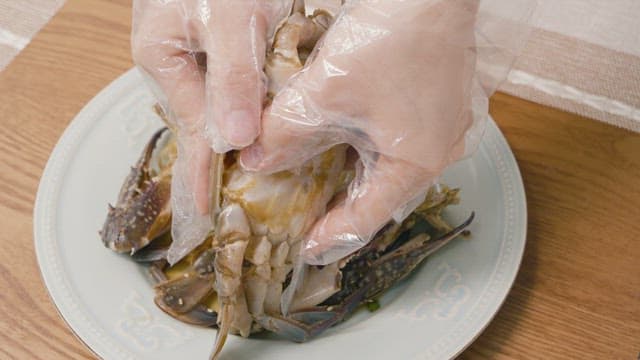 Cutting Apart Tasty Crab Shells of Soy Sauce Crab