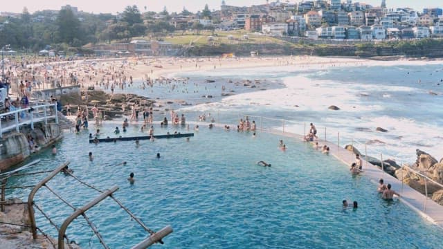Crowded Seaside Pool on a Sunny Day