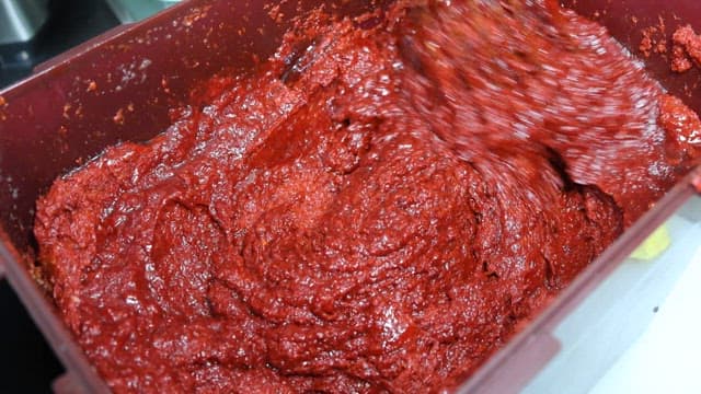 Stirring Freshly Ground Red Chili Paste