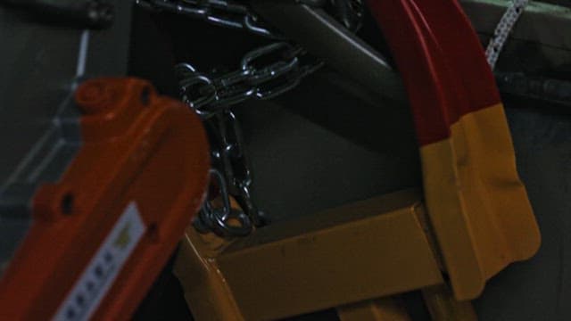 Firefighters Using Cutters to Open Door