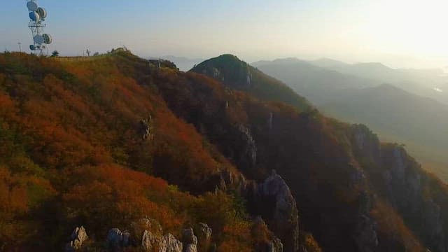 Beautiful Scenery of an Autumn Mountain with Sunrise