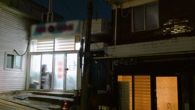 Quiet residential area lit up at night