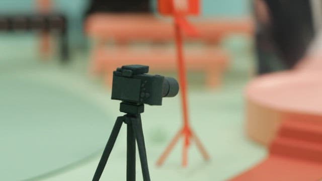 Diorama showing camera settings in a studio environment