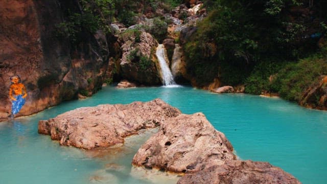 Exotic Deedote Blue Lagoon with Azure Pool in Lush Setting