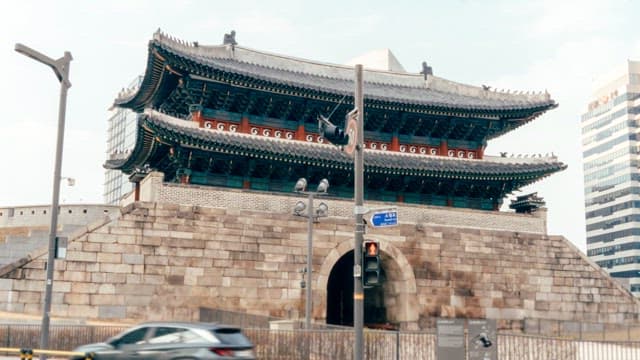 Sungnyemun gate in a bustling city