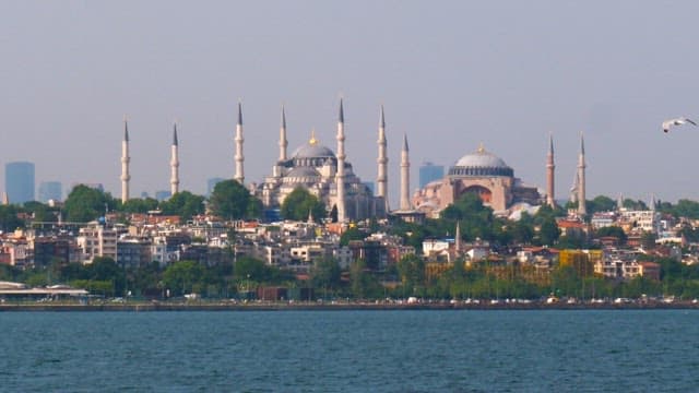 Historic mosques silhouette against the cityscape