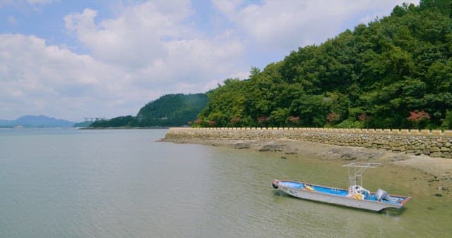 Serene Coastal Landscape with Moored Boat