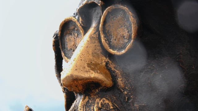 Statue of Anton Chekhov with a glasses