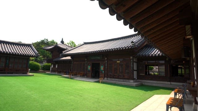 Traditional Korean Hanok Buildings in Green Courtyard